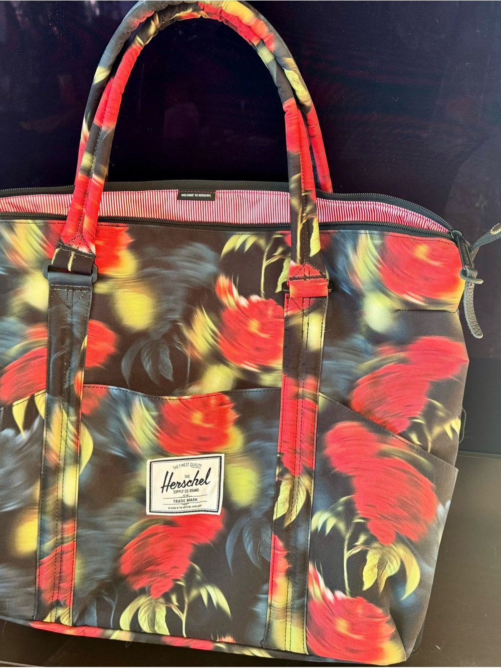 Herschel Supply Company Black Floral Tote with Red and Yellow Accents